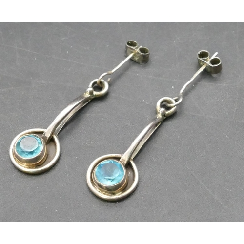 769 - A pair of modern Macintosh style silver drop earrings mounted with pearl and blue stones (boxed)