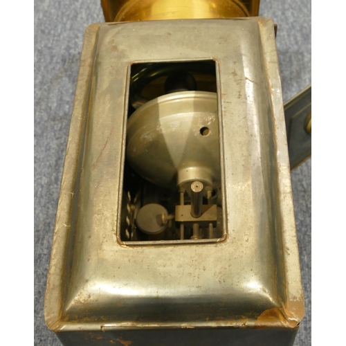 776 - A brass and metal magic lantern on wooden rectangular shaped based, 48cm long overall, 24.5cm high