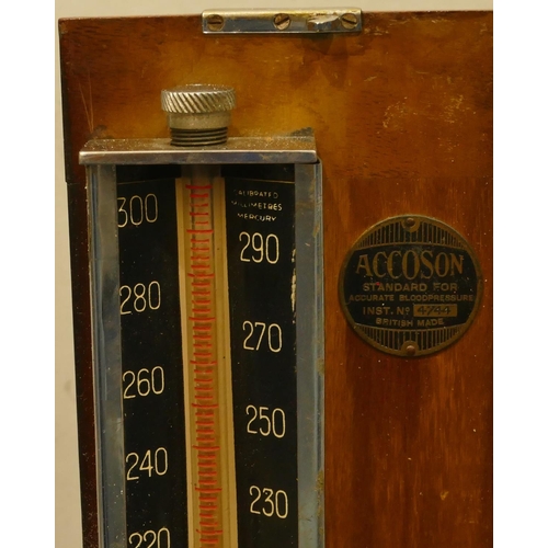 777 - An Accoson vintage mahogany blood pressure monitor in mahogany case with hinged lid, 37cm high (open... 