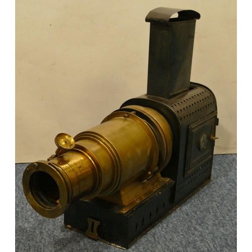 779 - A brass and metal magic lantern, 48cm long overall