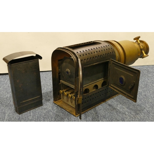 779 - A brass and metal magic lantern, 48cm long overall