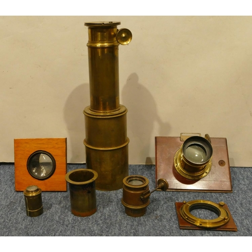 781 - A large brass lens, 2 other lenses etc.