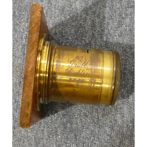 781 - A large brass lens, 2 other lenses etc.