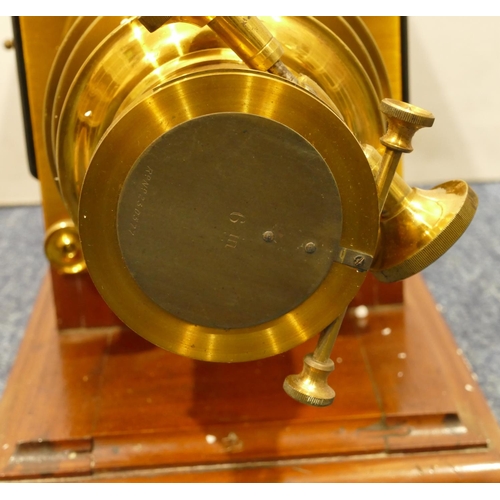 783 - A Victorian mahogany brass and black Japanned magic lantern, 54cm long overall