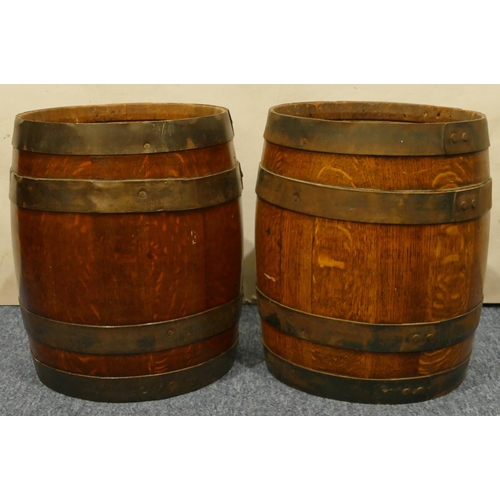 796 - A pair of oak banded miniature barrels, 33cm high, 29cm diameter