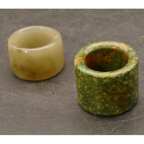 802 - 2 hardstone archer's rings