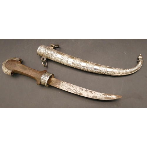 810 - A Middle Eastern dagger with silver coloured metal scabbard and mounts, wooden handle with embossed ... 