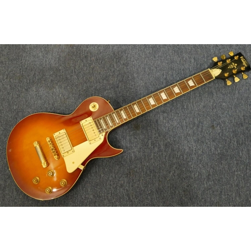 811 - A Vintage Les Paul style 6-string Cherry Sunburst electric guitar with case and Squire 15 amp (worki... 