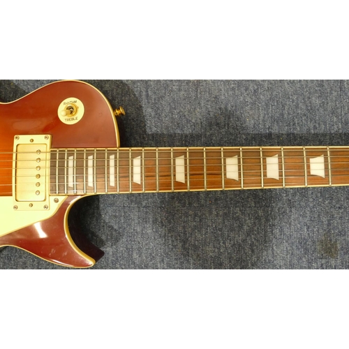 811 - A Vintage Les Paul style 6-string Cherry Sunburst electric guitar with case and Squire 15 amp (worki... 