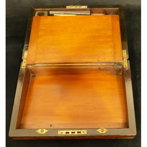 824 - A 19th Century burr walnut rectangular shaped writing box with brass mounts and corners, hinged lid ... 