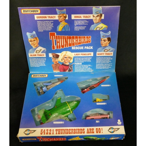 825 - Matchbox Thunderbirds Rescue pack with die cast models (boxed), 32cm wide