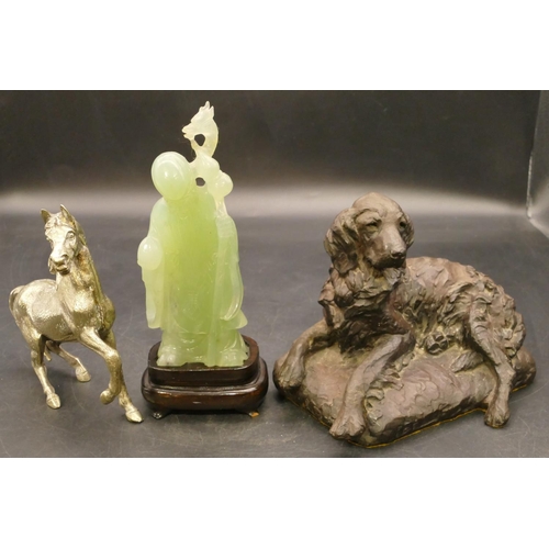 831 - A composition plaster bronze figure of a resting dog, 19cm wide (1 paw restored), a green hardstone ... 