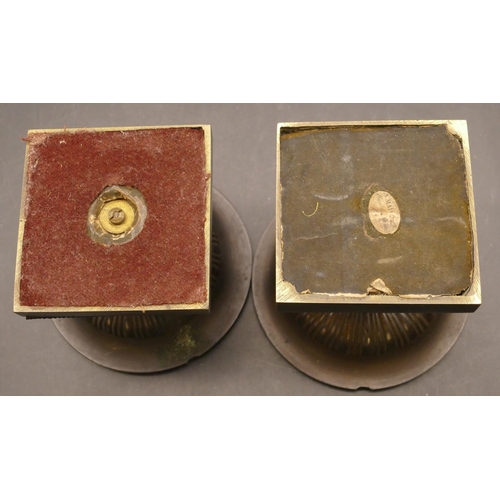 833 - A pair of small bronze urns on part marble square bases, 11cm diameter (stems slightly bent), 10cm h... 