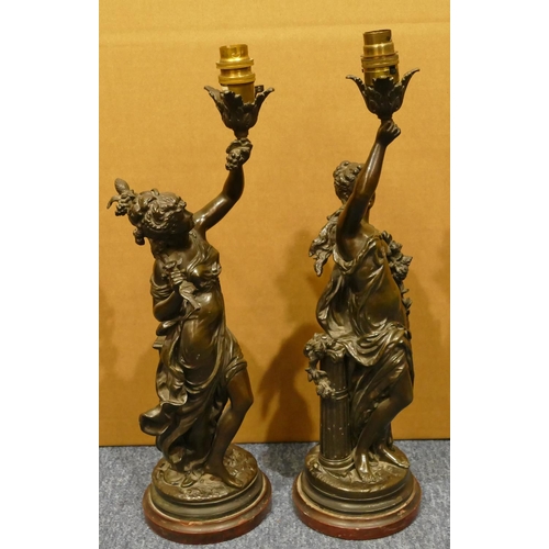 838 - Auguste Moreau (1834-1917), a pair of bronze table lamps in the form of standing ladies on red marbl... 