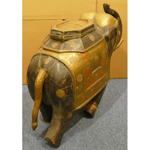 839 - A heavy Eastern hardwood figure of an elephant with allover copper and brass mounts, 80cm wide, 60cm... 