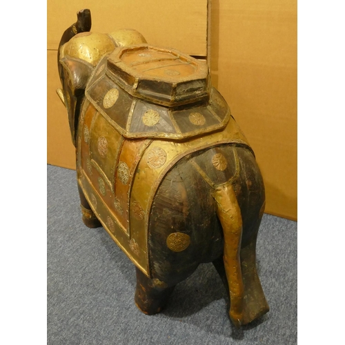 839 - A heavy Eastern hardwood figure of an elephant with allover copper and brass mounts, 80cm wide, 60cm... 