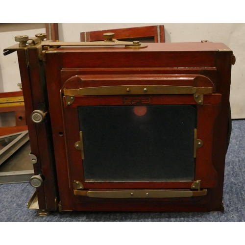 870 - Kodak mahogany and brass folding plate camera with some accessories