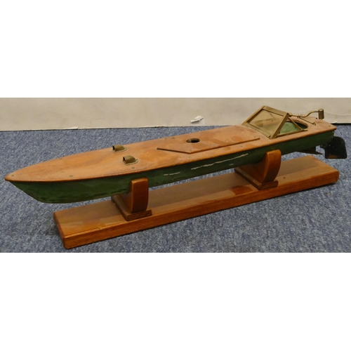 881 - A model launch boat, 47cm long, with stand