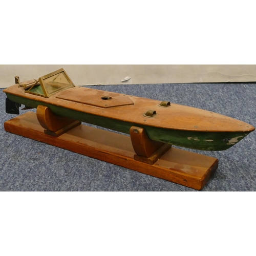 881 - A model launch boat, 47cm long, with stand