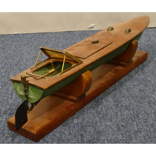 881 - A model launch boat, 47cm long, with stand