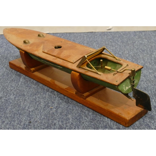 881 - A model launch boat, 47cm long, with stand