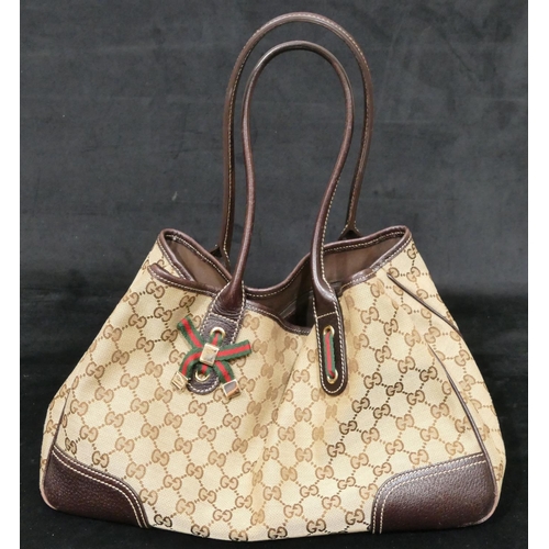 887 - A Gucci Tote bag Princey GG canvas leather beige/dark brown, no. 163805/1781 with ribbon motif