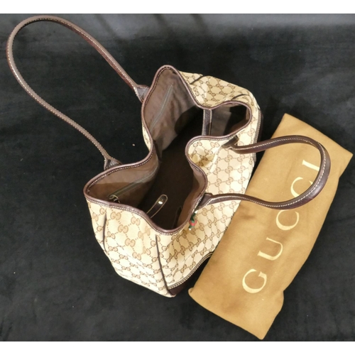 887 - A Gucci Tote bag Princey GG canvas leather beige/dark brown, no. 163805/1781 with ribbon motif