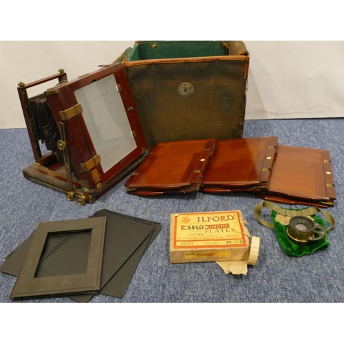 893 - A Thornton Pickard folding mahogany plate camera with leather case (case in need of restoration)