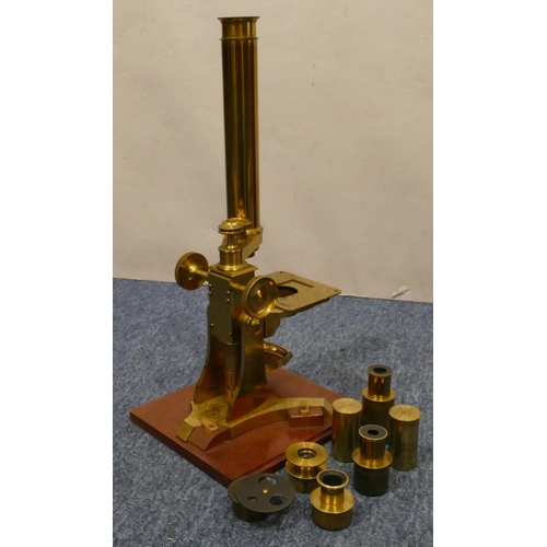 895 - Dolland & Co. brass microscope with various lenses, in mahogany case (hinges to door a/f), microscop... 