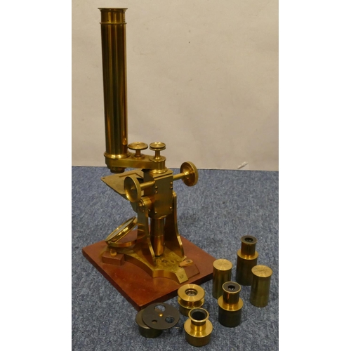 895 - Dolland & Co. brass microscope with various lenses, in mahogany case (hinges to door a/f), microscop... 