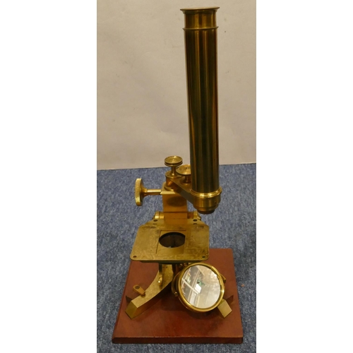 895 - Dolland & Co. brass microscope with various lenses, in mahogany case (hinges to door a/f), microscop... 