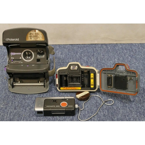 909 - A Canon Sure Shot A1 camera, a Polaroid Cool Cam, and a  Agfamatic 2000 Sensor camera (3)