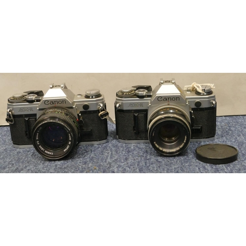 912 - 2 Canon AE-I cameras