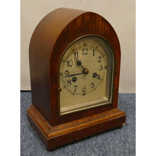 938 - Camerer Cuss & Co. oak 8-day striking mantel clock with silvered arched dial with Arabic numerals on... 