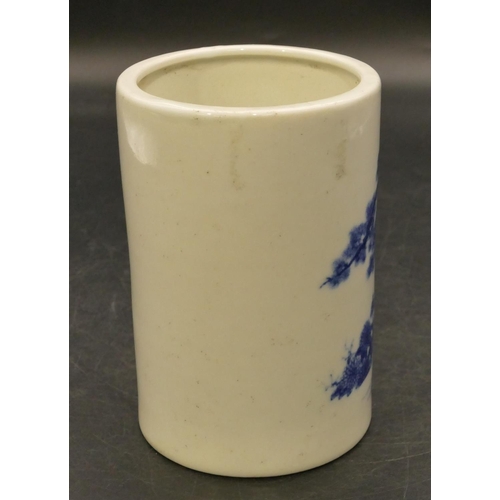 95 - An Oriental cylindrical brush pot on blue and white ground with figure and tree decoration, 12.5cm h... 