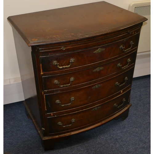 954 - A reproduction mahogany small bow fronted chest of drawers with brush slide, 4 long graduated drawer... 