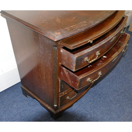 954 - A reproduction mahogany small bow fronted chest of drawers with brush slide, 4 long graduated drawer... 