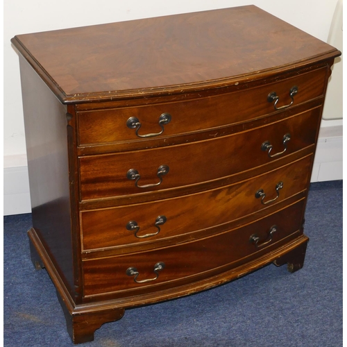 958 - A reproduction mahogany bow fronted chest of drawers with banded top, 4 long graduated drawers with ... 