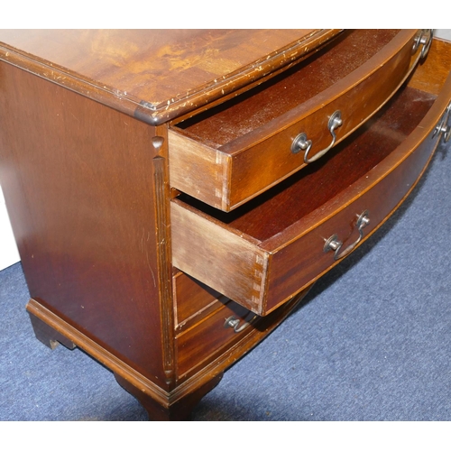 958 - A reproduction mahogany bow fronted chest of drawers with banded top, 4 long graduated drawers with ... 