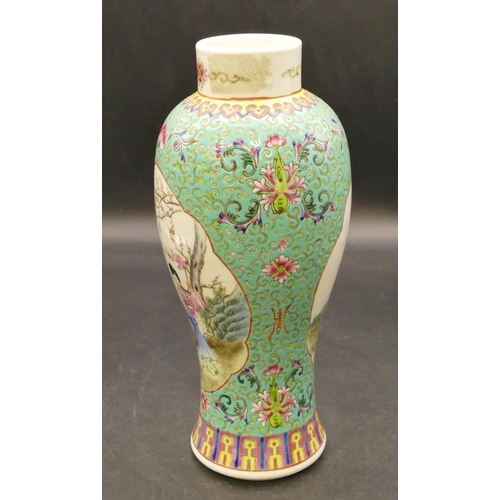 96 - An Oriental round bulbous thin necked vase on pale green and white ground with multicoloured figure,... 