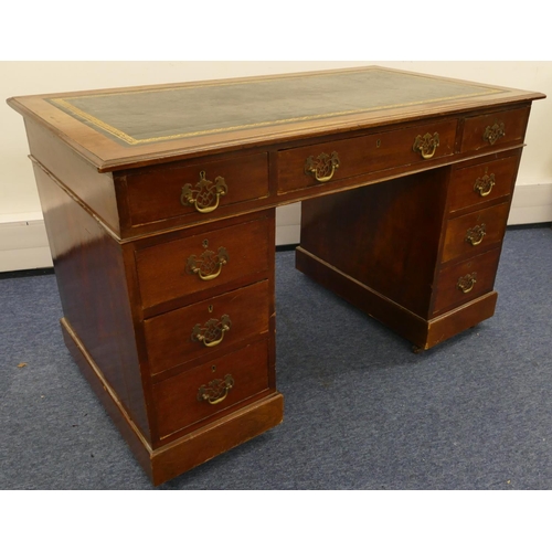 964 - A 19th Century mahogany small kneehole double pedestal desk with green leather inset top, centre dra... 