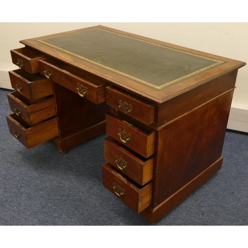 964 - A 19th Century mahogany small kneehole double pedestal desk with green leather inset top, centre dra... 