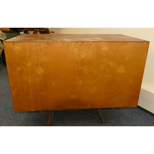 967 - A vintage Stag small cupboard with 4 graduated drawers and a single panel door, steel handles and le... 