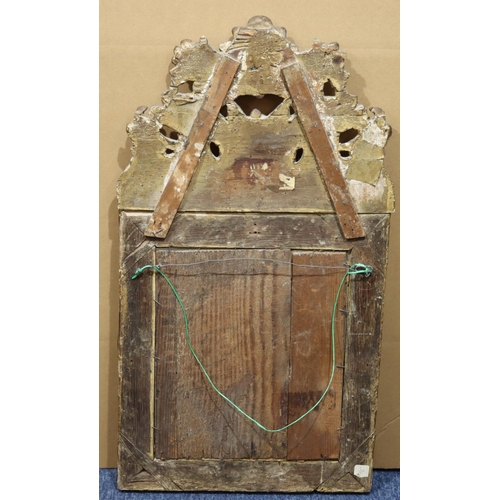 973 - An 19th Century gilt wood hanging wall mirror with carved and pierced bird, floral, leaf and scroll ... 