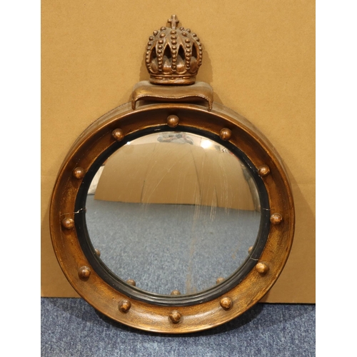 974 - A gilt hanging convex wall mirror with crown motif and inner ball rim, 52cm high (repainted)