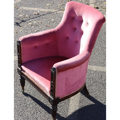 975 - A 19th Century mahogany tub chair with pink velvet overstuffed seat, button back and arms, raised ca... 