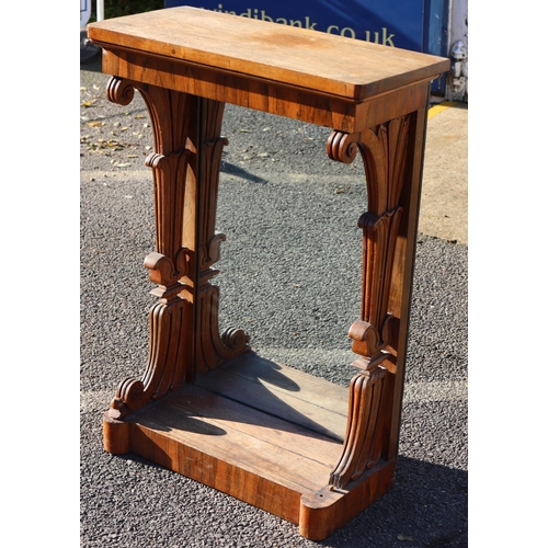 976 - A 19th Century rosewood console table with mirrored back, scroll supports (1 scroll foot missing), 6... 