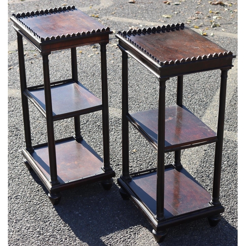 977 - A pair of 19th Century rosewood whatnots with scallop shaped galleries, corinthian column supports o... 