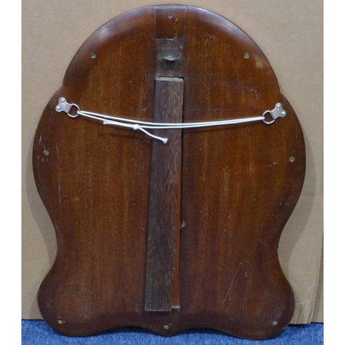 981 - A good quality walnut and mahogany scallop shaped bevelled freestanding and hanging mirror, with hin... 