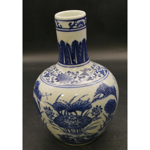 99 - An Oriental round bulbous thin necked blue and white vase with bird, lily and floral decoration, 22c... 